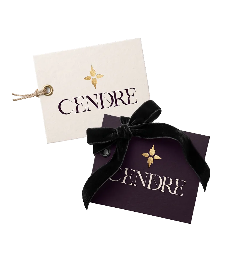 Cendre swing tags in cream and plum colourways